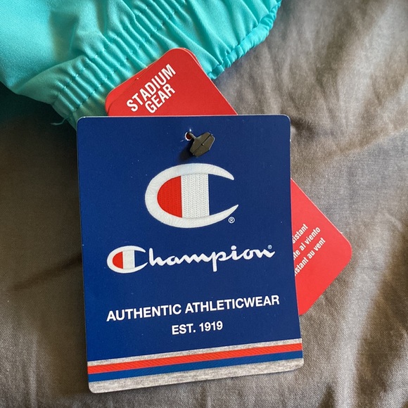 A blue champion rain coat - Picture 3 of 3